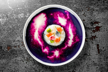 Wall Mural - Scallop crudo on a plate with sauce