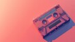 A vintage cassette tape on a pink background, evoking nostalgia and retro vibes