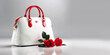 © starblue - elegant female handbag in white and red design with red roses with copy space