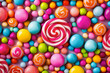 Colorful lollipops and candy background. Top view