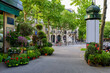 Cozy street with flower shop in Paris, France. Cityscape of Paris. Architecture and landmarks of Paris