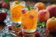 Two glasses of sparkling summer fruit drink with fresh berries, mint, and ice, set on a rustic wooden table