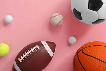 Poster - Many different sports balls on pink background, flat lay