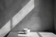 Minimalist cup in monochrome with geometric shadows. Artistic still life photography for design and print