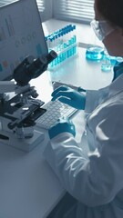 Poster - In this video, a virology researcher analyzes tissue samples for viruses using microscopic techniques. His work helps in understanding the spread of infections and the development of new methods to