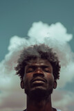 Fototapeta  - black man with cloud in front of his face