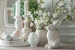 An elegant Easter scene with a ceramic bunny, beautifully patterned eggs, and fresh white flowers