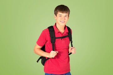 Wall Mural - Image of young male student posing on background