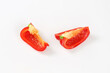 Two red bell pepper quarters