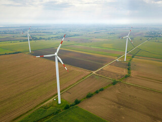 aerial view of energy producing wind turbines, poland