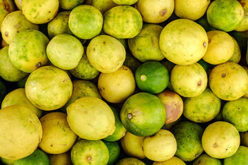 Wall Mural - Fresh oranges fruit as background in Thailand market