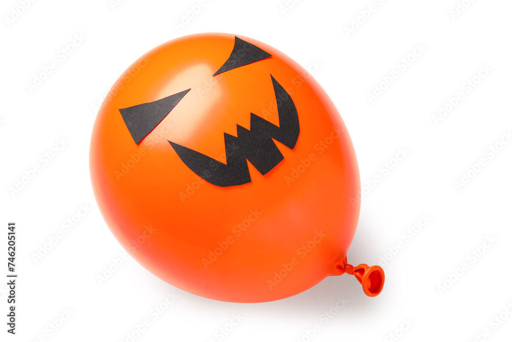 Funny Halloween orange balloon on white background