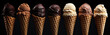 Row of delicious chocolate, cream, coffee, caramel, vanilla, hazelnut and truffle flavored ice cream scoops in waffle or sugar cones on black background. Summertime cold sweet dessert banner.