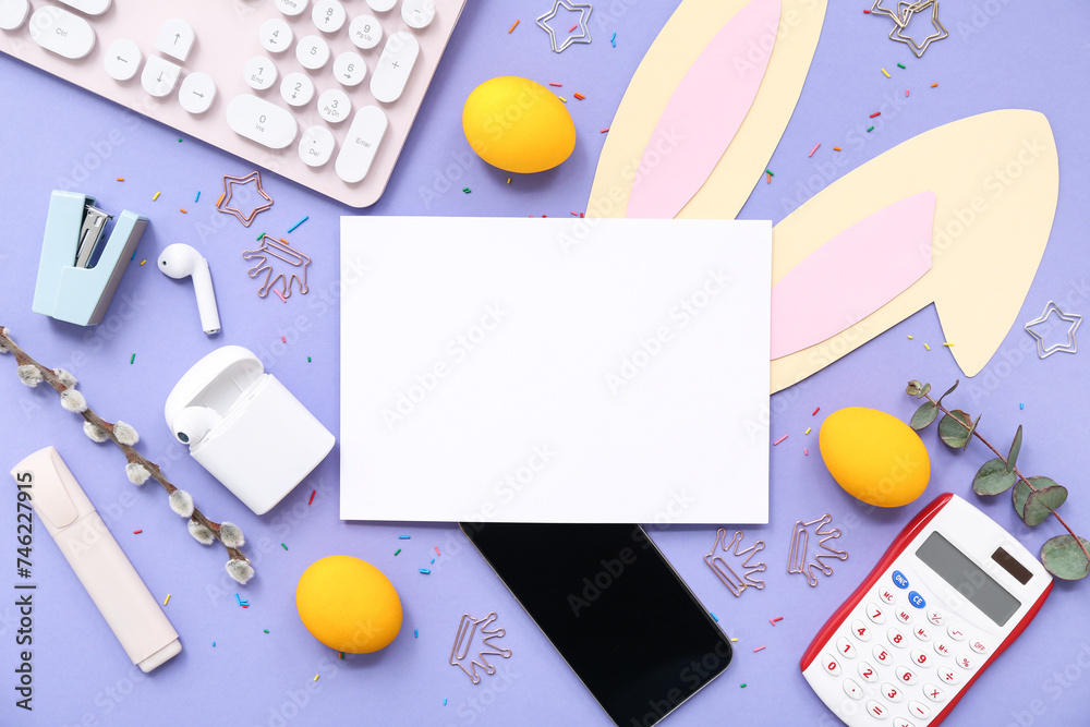 Easter eggs, paper, bunny ears, calculator and computer keyboard on lilac background