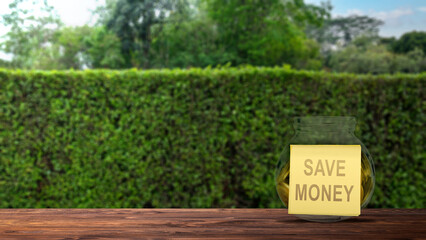 Poster - Golden coins inside the jar and notepaper with 'save money' text