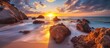 A vertical view capturing the captivating coastal rocks as the sun sets over the ocean.