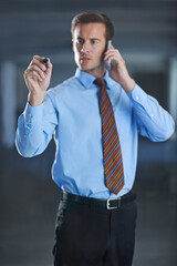 Poster - Businessman, planning and writing on glass with pen for notes of phone call, ideas or strategy for future. Virtual, communication and man problem solving on window or screen in workplace with contact