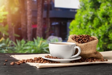 Canvas Print - Cup of hot aroma coffee with roasted beans