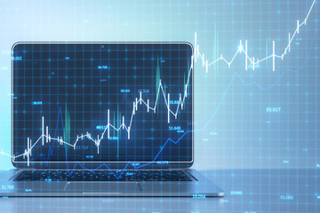 Leinwandbilder - A stylish laptop displaying a rising stock market graph on screen with digital tech background suggesting growth