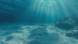 Ocean underwater scene with crepuscular rays, god rays, penetrating the surface of the water and light filtering down into the blue, nature background, texture, template. Coral reef and shallows