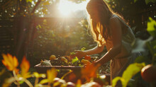 Young Woman Throwing Leftover Food In A Compost Bin In The Garden To Reduce Household Waste Using A Composter