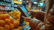 People use mobile phones to scan QR codes for payment.