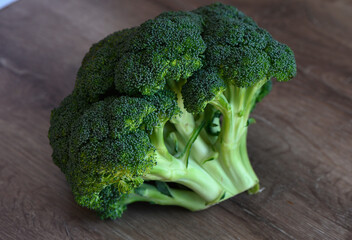 broccoli on a wooden table in the kitchen 2