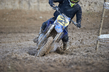 Wall Mural - Motorbike stuck in the mud