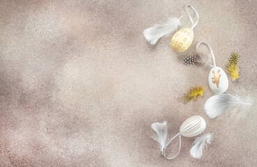 Wall Mural - easter composition. easter eggs with feathers background. happy easter card design. top view