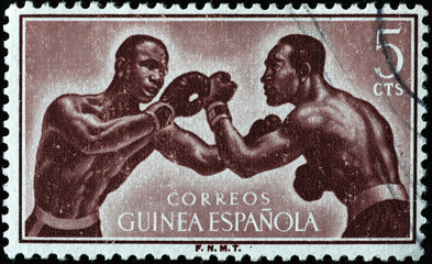 Wall Mural - Boxers on vintage postage stamp of Spanish Guinea