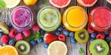 Fototapeta Przestrzenne - Assorted fresh juices with fruits on a wooden background