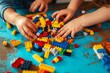 Vilnius, Lithuania - February 23, 2019. Children hands play with colorful lego blocks on the table, Generative AI