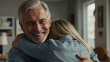 Cheerful Beautiful Adult Daughter Child Hugging Elder Grey Hair Dad From Behind With Love, Affection, Gratitude, Visiting Parent At Home, Looking At Camera, Smiling, Laughing 