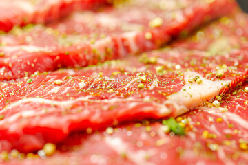 Wall Mural - beef steak texture of a detailed close-up showing the red meat