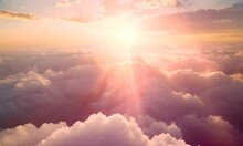 Sunset Above The Clouds With Sun Rays. The Concept Of Peace And Tranquility.