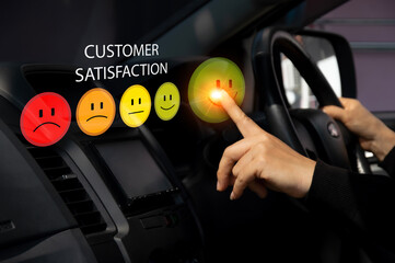 Users rate their service experiences in an online application for the post-service customer satisfaction survey concept at the auto center.