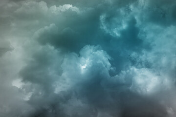 Wall Mural - background of dark clouds before thunder storm