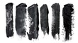 Abstract black paint smudges on a clean white surface, suitable for artistic projects