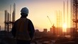 Silhouette engineer standing orders for construction and discuss the contract with the sub contractors Heavy industry and safety at work over blurred  background sunset pastel
