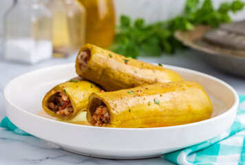 Wall Mural - Stuffed zucchini with meat from traditional Turkish cuisine. Turkish name; etli kabak dolmasi