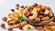 dry nuts with dry fruits on white backgrounds