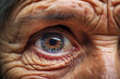 Eye of an elderly woman, close-up, selective focus.