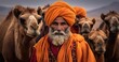 an indian man in an orange garment with several camels