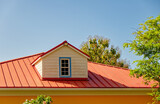Fototapeta Miasta - Dormer on Red Metal Roof