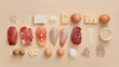 Various protein sources arranged on a beige background. Flat lay composition with copy space. Nutrition and healthy eating concept for design and print, suitable for dietary infographic or menu