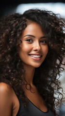 close-up portrait of smiling young Colombian woman face with beautiful brown black curly hair, smooth skin and green eyes