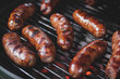 Close-up of tasty grilled bbq sausages on the grill