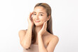 © Shutter B - Happy beautiful young asian woman smile touching her face on white background, clean fresh bare skin concept. Facial treatment, Perfect skin, Natural make up.