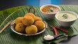 South indian food called vada sambar or sambar vada or wada, served with coconut, green