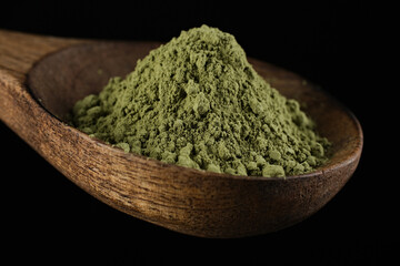 Poster - matcha green tea powder sprinkle in wooden spoon